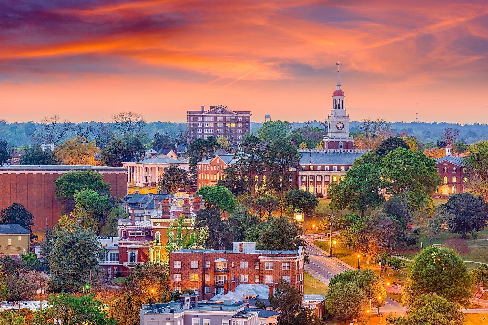 Macon, Georgia historic district at dusk with church steeple and downtown buildings